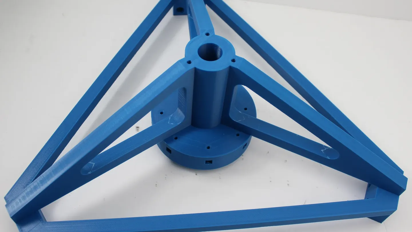 A blue delta-robot triangular frame component