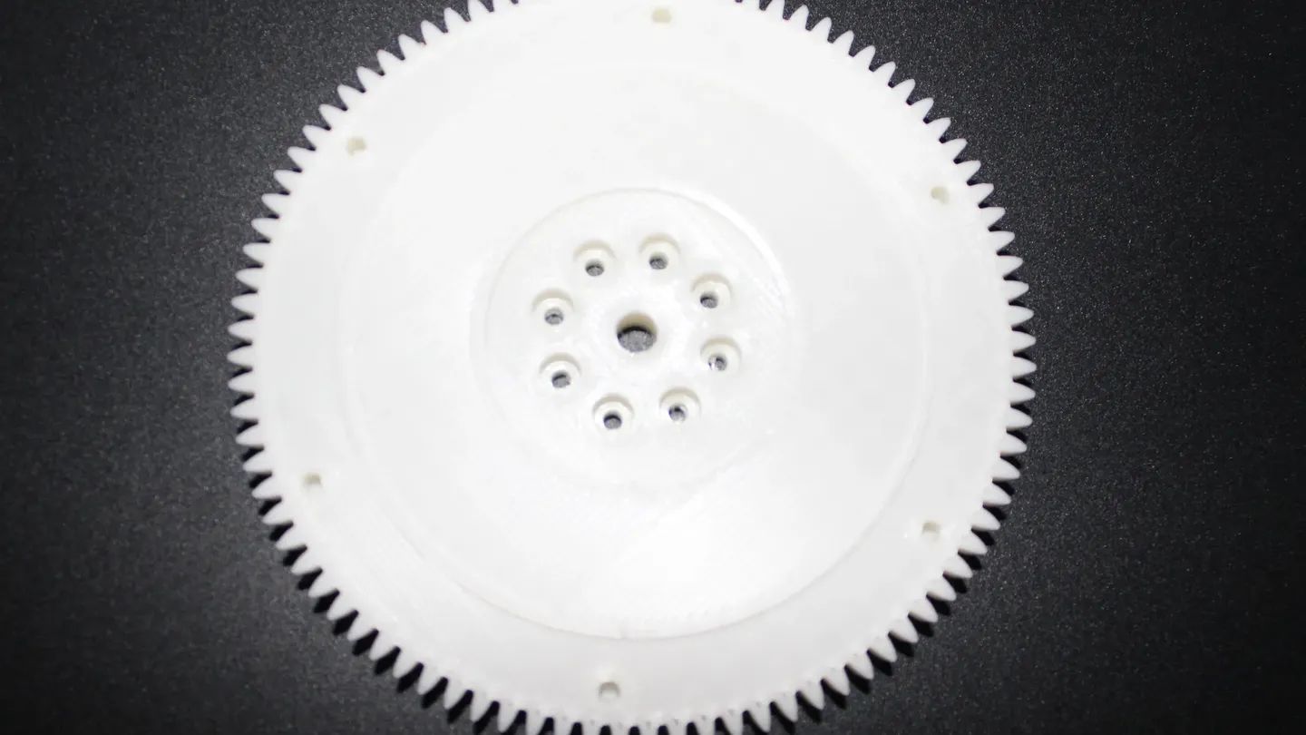A large-diameter functional gear, 3D-printed in white
