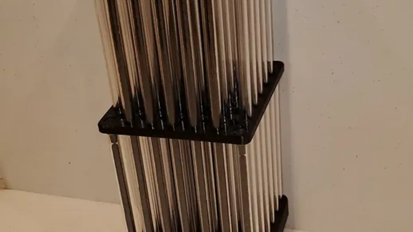 A multi-tier vial rack, 3D-printed in black